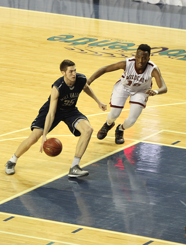 Senior Clayton Holmberg goes towards the basket.