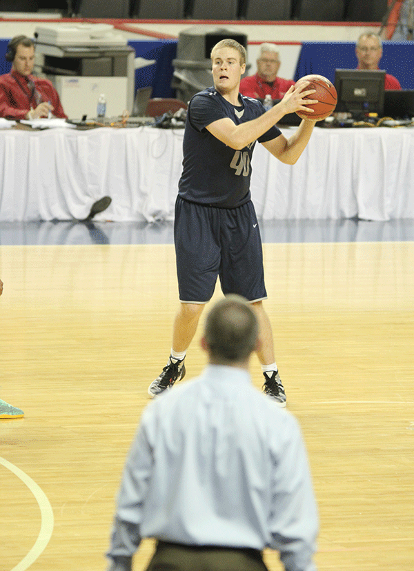 Senior Tyler Grauer gets ready to pass the ball.