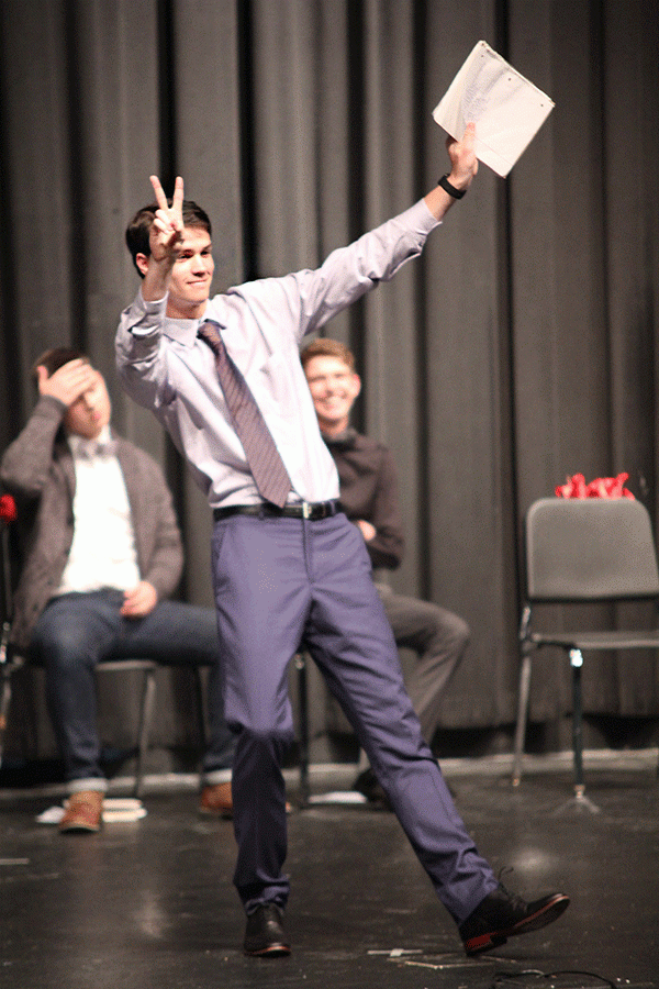 Senior Cooper Hutteger gives a pose for his homecoming wear.