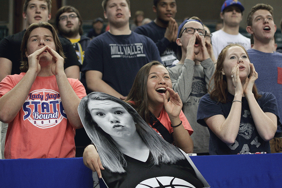 As Salina attempts a free throw, seniors Tyler Shurley, Marisa Macias and Ally Henderson yell to distract the shooter.