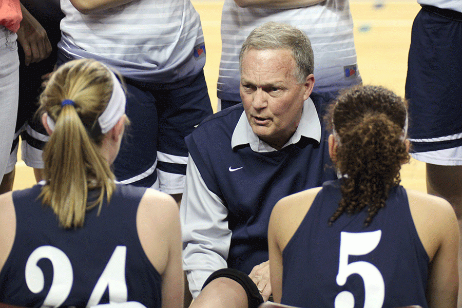 Head coach John McFall motivates the team during a timeout.
