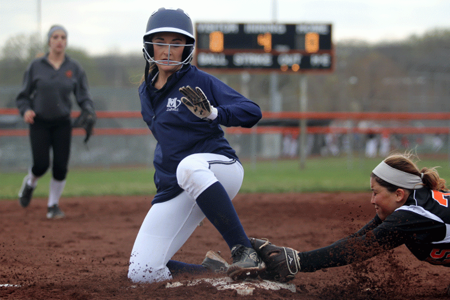 Sliding into second base, senior Rienna Schriner prepares to stop. In a double header against the Bonner Springs Braves, the team won both games 13-0 and 13-2 on Thursday, March 24. 
