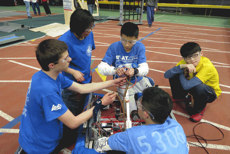 Robotics team assists Chinese competitors at regional competition