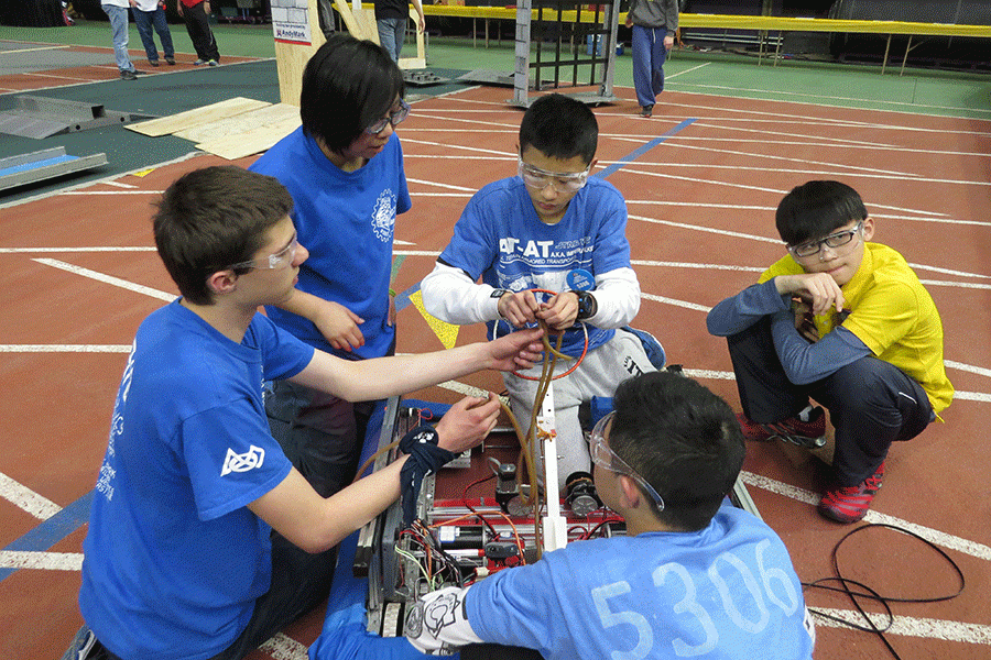 In order to help rebuild their robot, freshman GiGi Lin acts as a translator for the team in order to communicate with a team from China.
