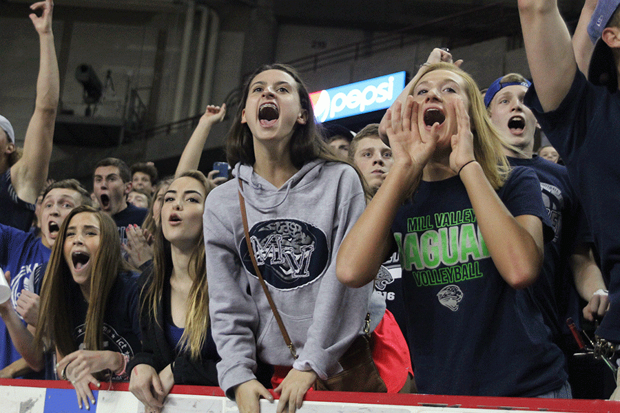 After senior Jaison Widmer makes two free throws, the crowd cheers in excitement.