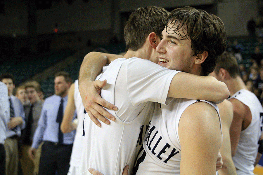 Seniors Logan Koch and Jacob Klenda hug after the game.