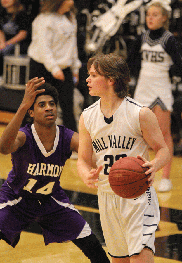 Sophomore Cooper Kaifes looks for an open teammate to pass the ball to.