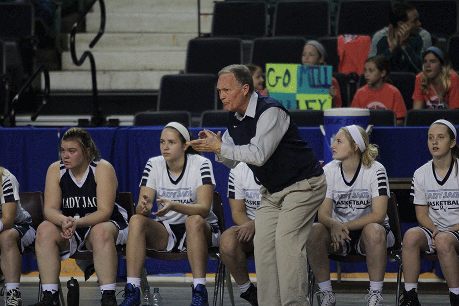 Coach John McFall encourages his team.