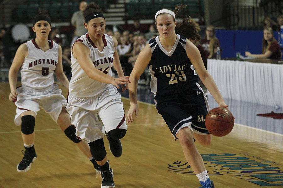 Freshman Claire Kaifes runs down the court. 