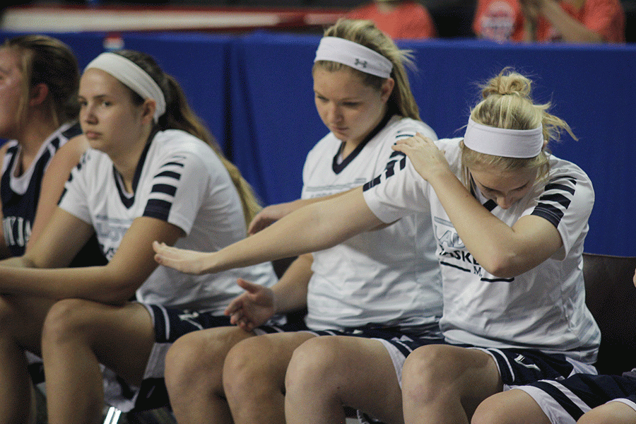 Junior Emma Dandridge dabs when the Lady Jags make a free throw.