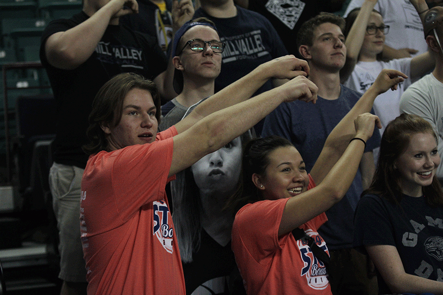 Seniors Tyler Shurley and Marisa Macias hold up their hands when the Lady Jags shoot a free throw. 