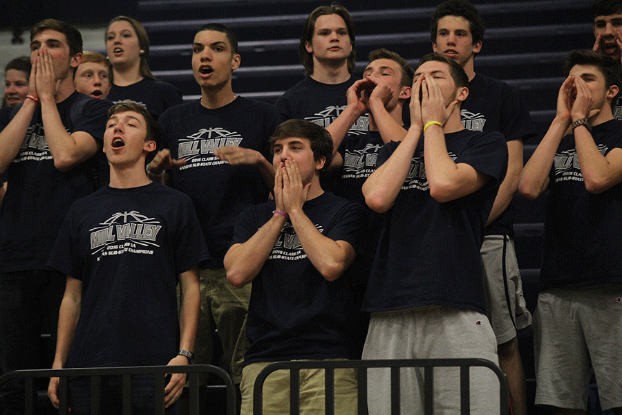 The boys basketball team chants along to Hey, Hey, Whatdya Say?