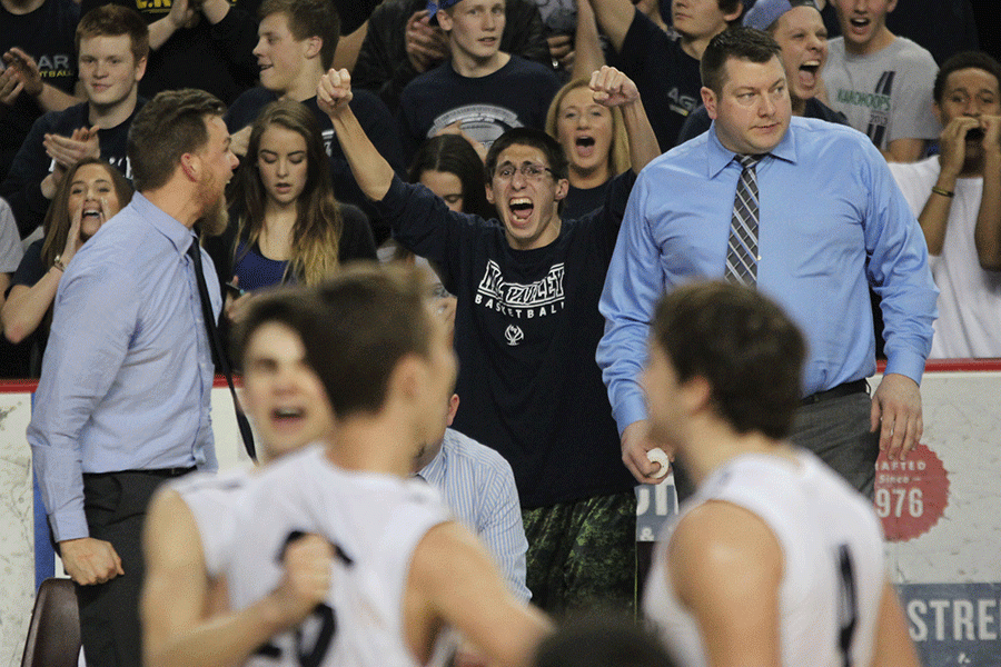 Manager James Bock celebrates after a call in the Jaguars favor.