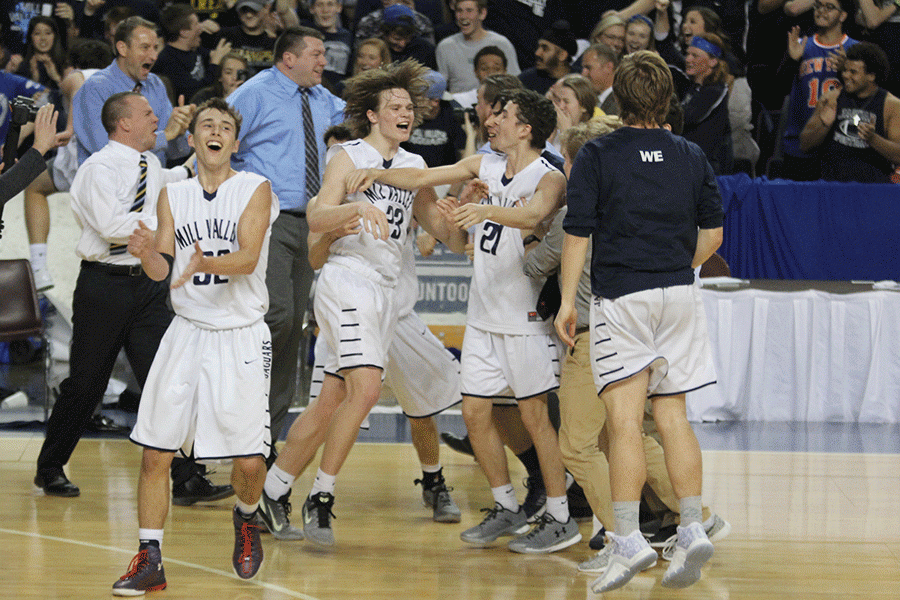 Sophomore Cooper Kaifes and the rest of the basketball team celebrate after winning the state title.