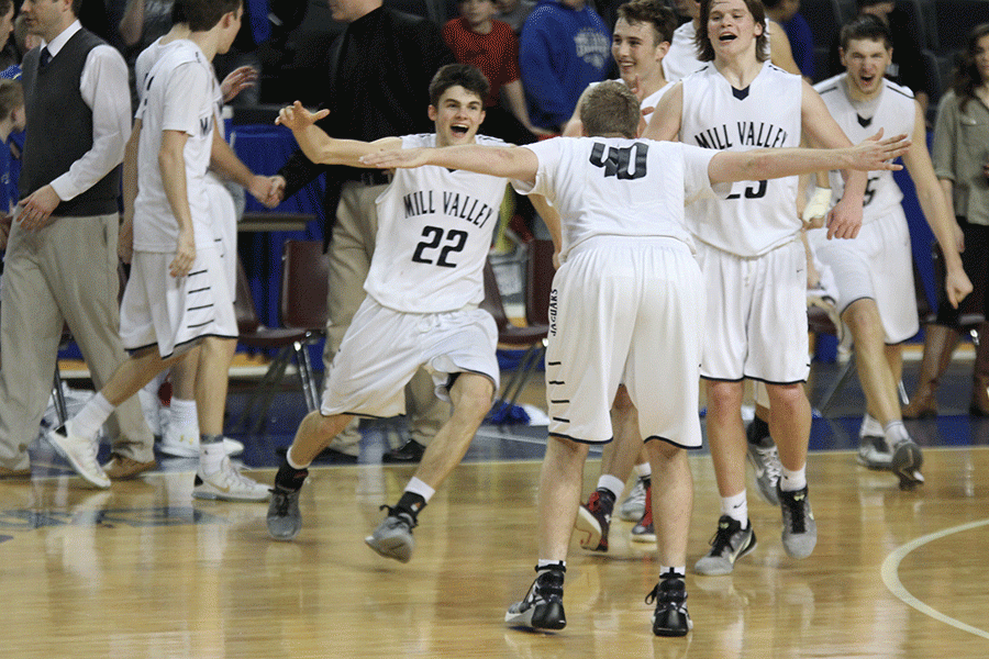 Senior Kasey Conklin runs into senior Tyler Grauers arms.