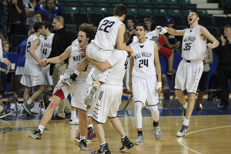 Senior Tyler Grauer holds senior Kasey Conklin after the win.