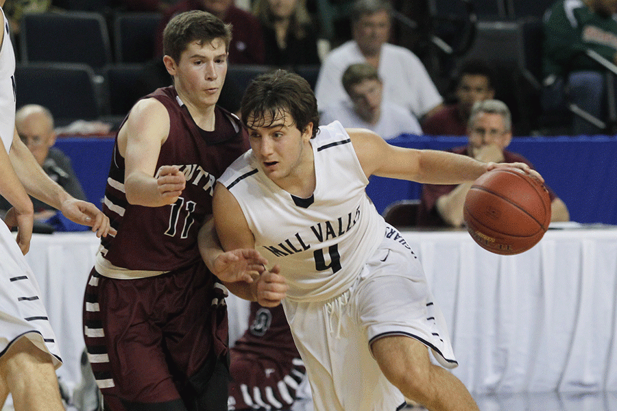 Senior Logan Koch pushes past his opponent.