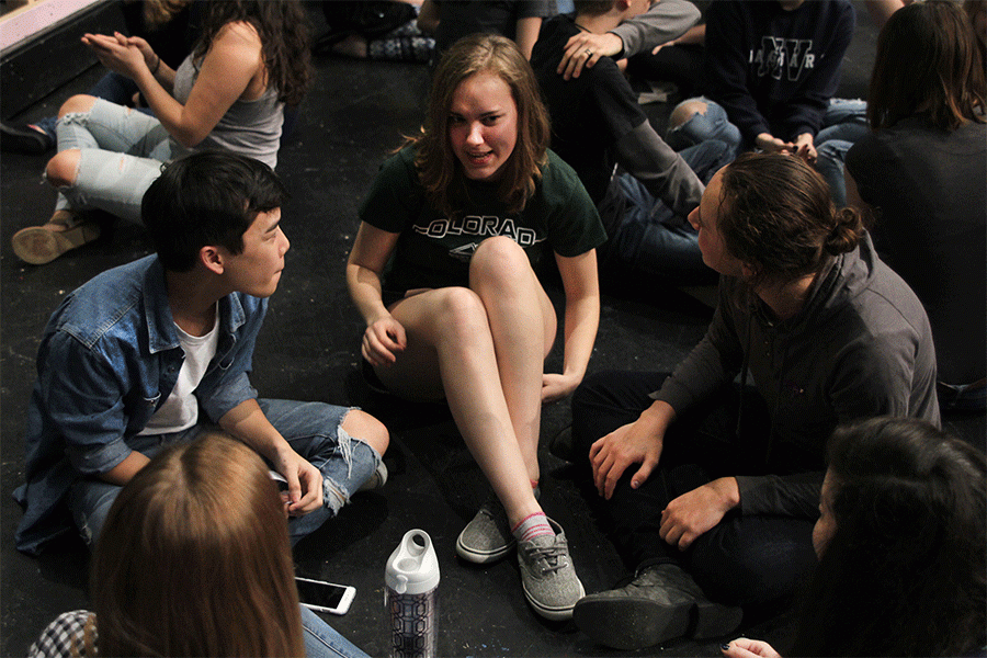 With the attention geared towards her during a team building exercise, senior Hannah Schrepfer discusses with her group who she admires most at Mill Valley on Thursday, March 31.
