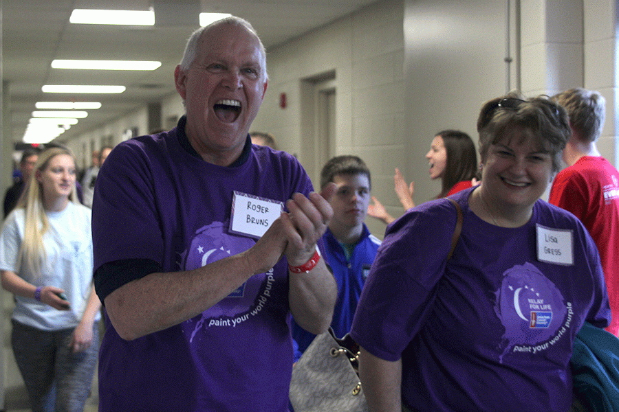 Retired+teacher+Roger+Bruns+leads+the+survivor+walk+at+Relay+for+Life.