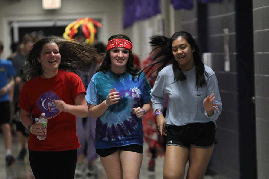 Participants walk during the Poker Relay.