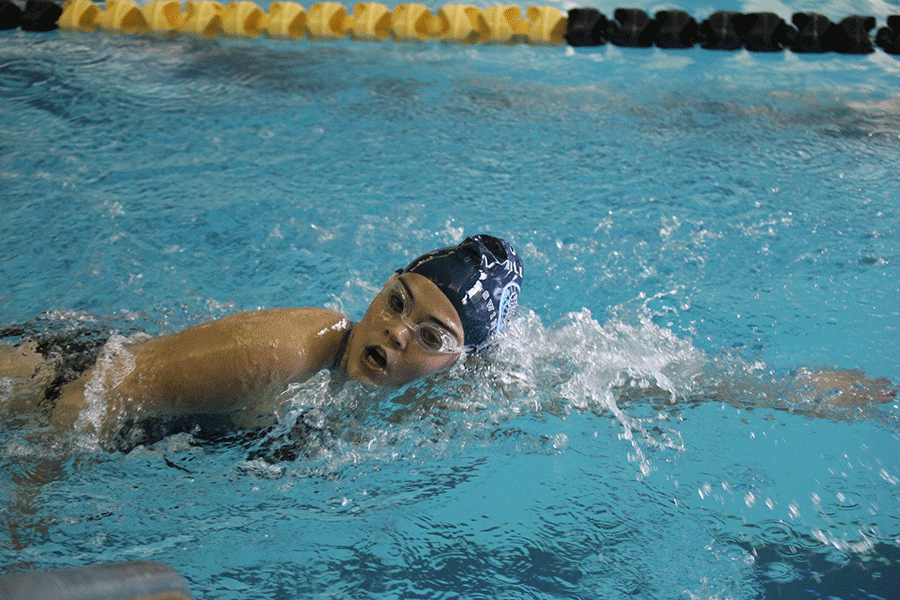 Coming up for air, sophomore Bailey Wagoner competes in the 500 yard freestyle.