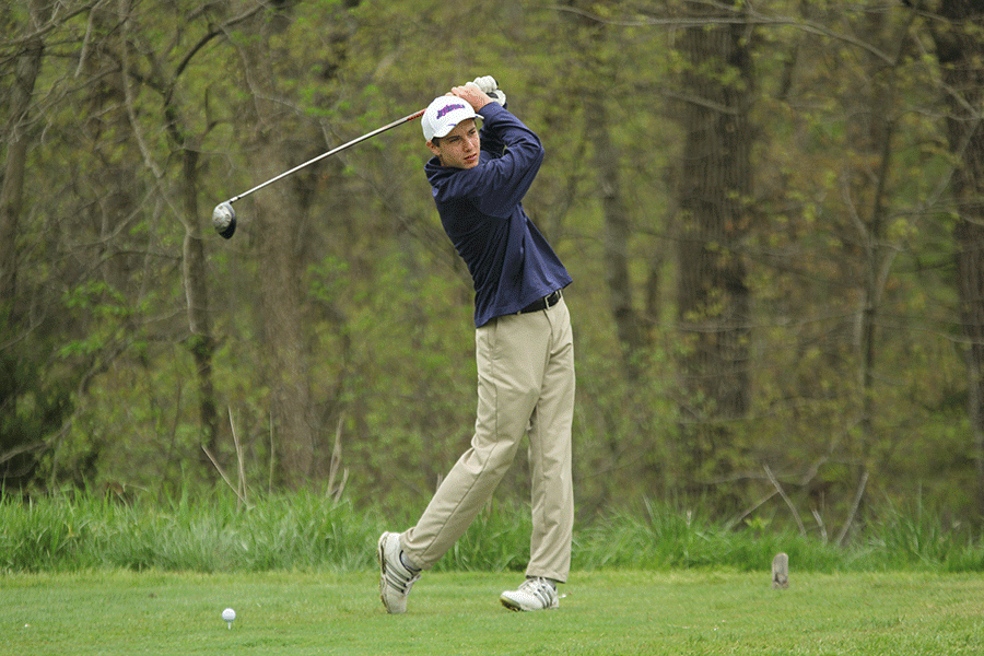 On his last hole, sophomore Kyle Bonnstetter follows through his swing on Thursday, April 21.