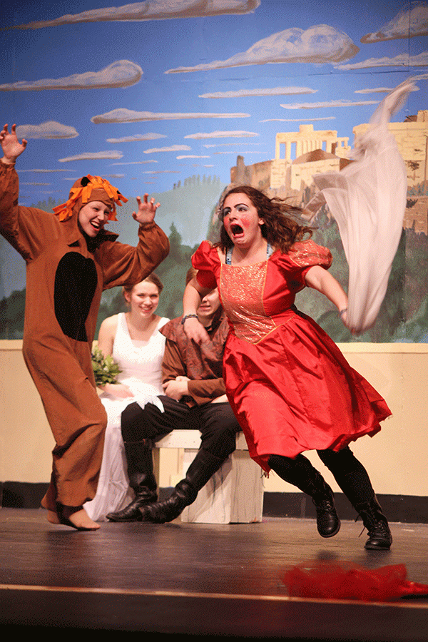 Francis Flute, played by junior Savannah Hurd, runs from the lion.