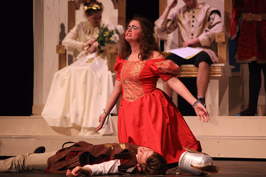 After Pyramus stabs himself with his pretend sword in the play for the wedding ceremony, Thisbe, played by Savannah Hurd, cries for her love.