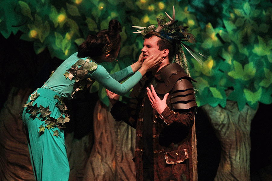 As Puck, senior Camille Gatapia attempts to calm Oberon, played by senior Justin Curto.
