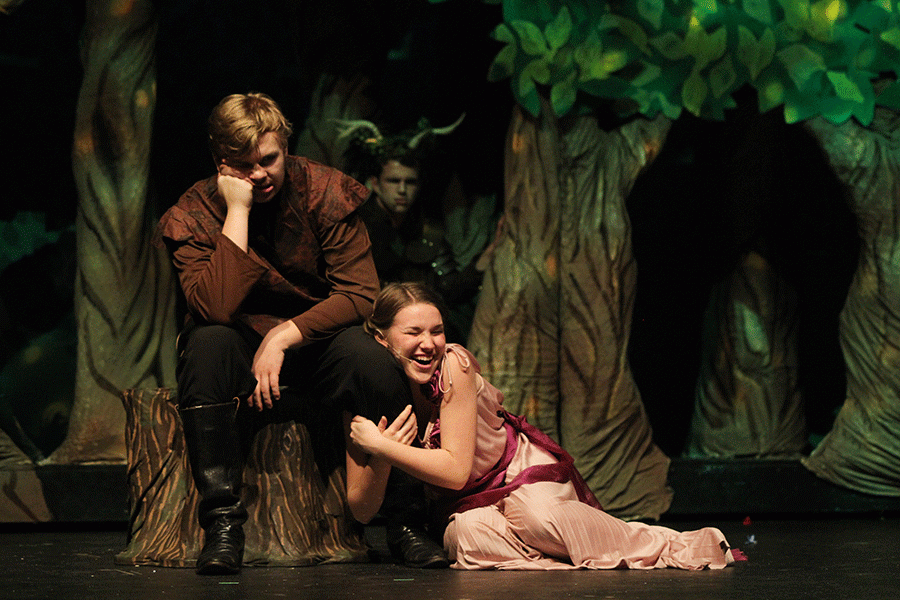 As Helena, senior Sarah Myers holds onto Demetrius, played by Carson Vitt.