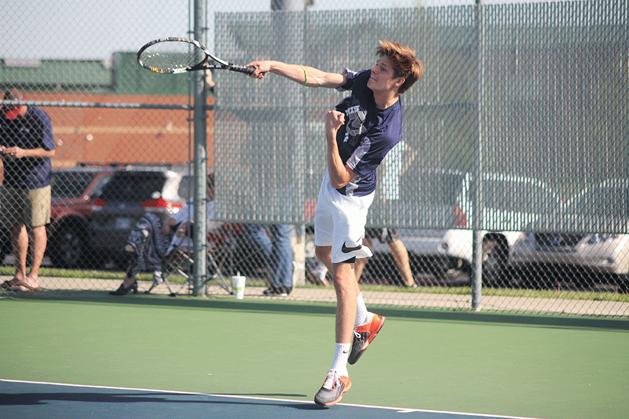 Junior Jansen McCabe competes in a singles match