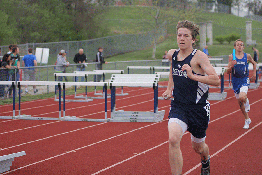 Sophomore Mitchell Dervin finishes a lap in the boys 4x800 meter relay.