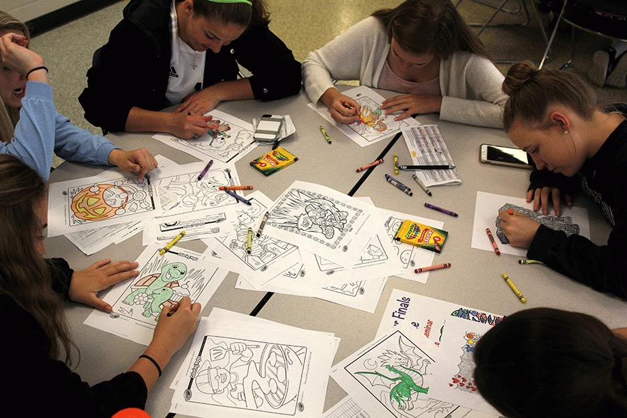 Students spend their seminar on Wed. April 27 coloring at the Color Your Finals Stress event held by JagPRIDE in the senior cafe.