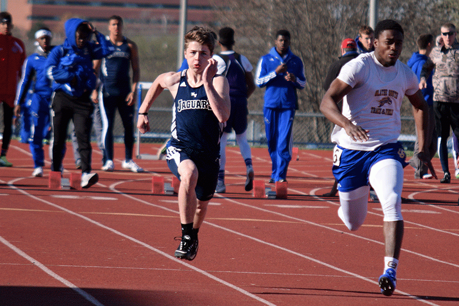 During the track meet at the Olathe District Activity Center on Friday, April 8, freshman Steven Colling runs a sprint.