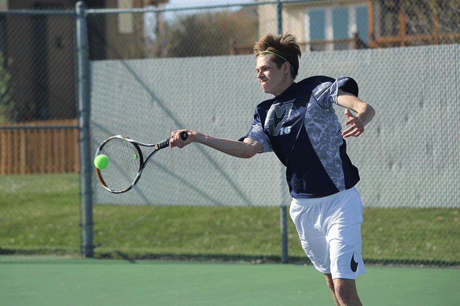 Junior Jansen McCabe makes contact with the ball.