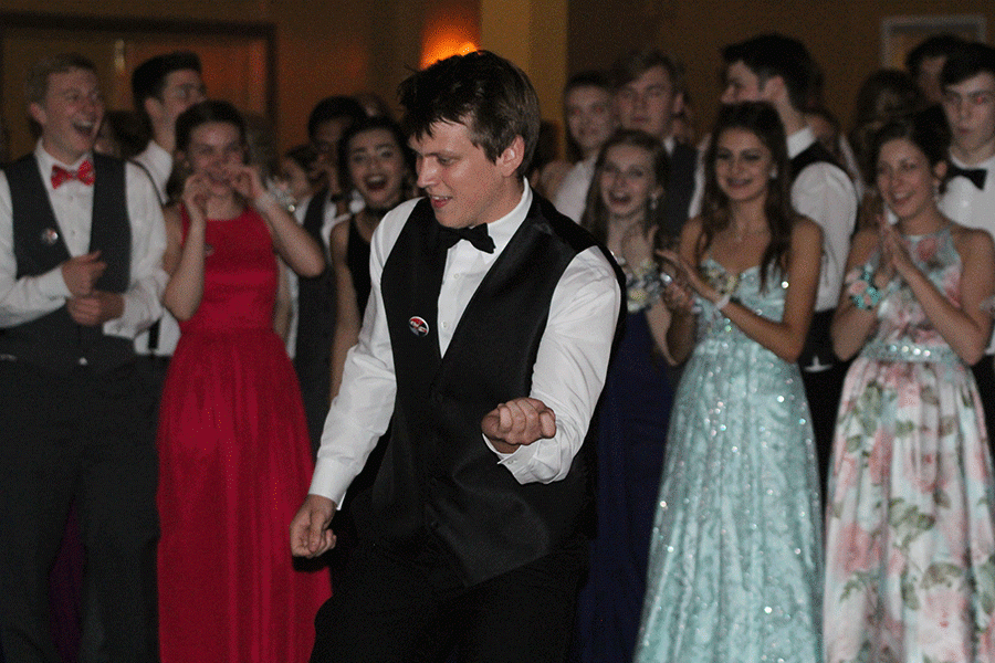 Junior Chris Weber whips while he dances.