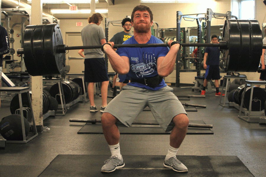 Junior Dylan Smith hang cleans 315 lbs. during his Advanced Strength and Conditioning class on Thursday, March 31. 