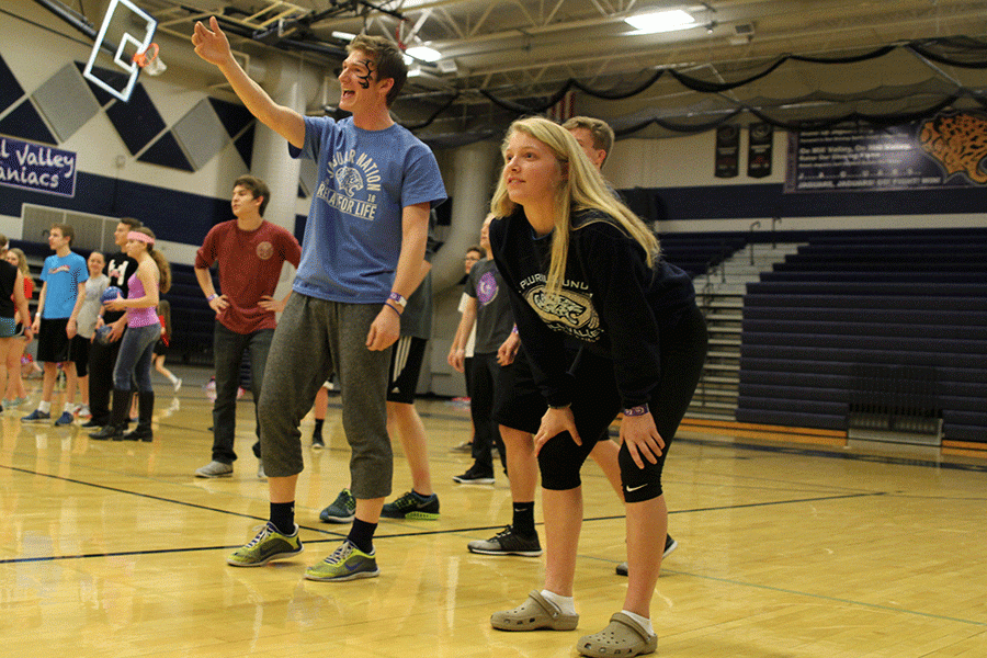 Juniors Nick Nelson and Kasey Meeks play dodgeball. 
