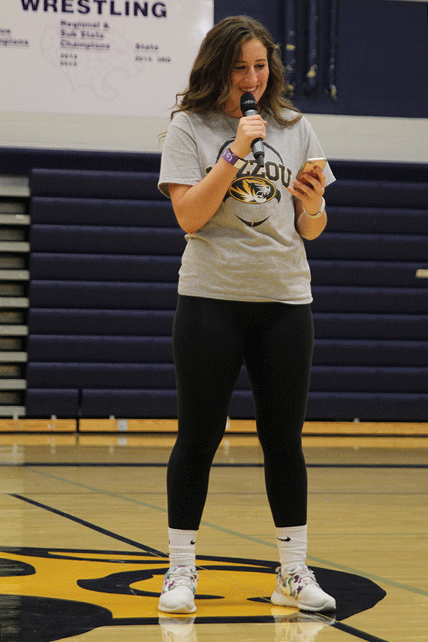 Junior Riley Doyle shares during the open mic session. 