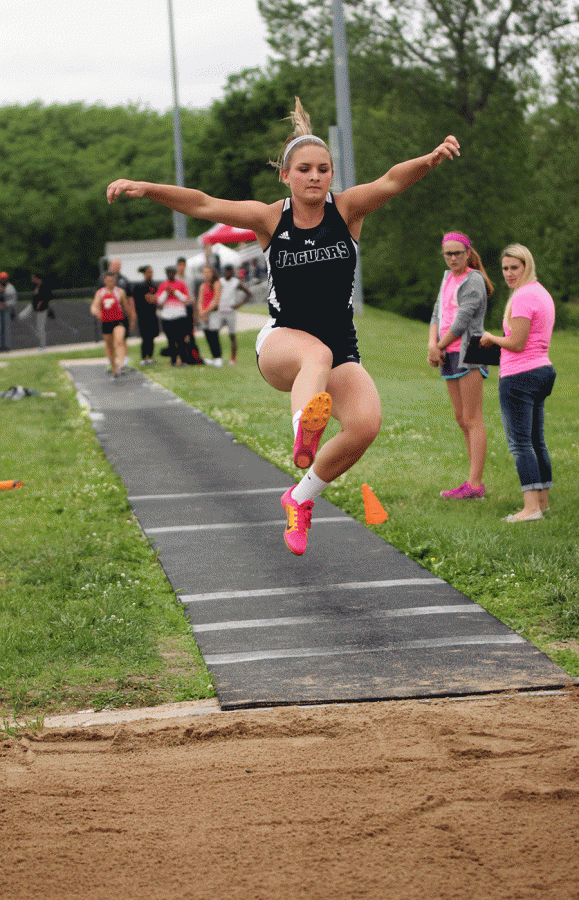 Sophomore Lucy Holland starts her third jump in the girls triple jump.