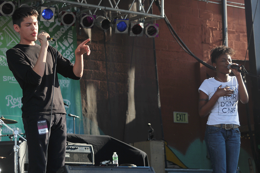 Theta Intellect rapper-trumpeter Parker Bata and vocalist Jaquaylah Taylor sing together during Theta Intellect's Middle of the Map Fest set at CrossroadsKC. After winning Middle of the Map Fest's Teen Battle of the Bands competition at the Nelson-Atkins Art Museum a few months prior, Theta Intellect earned a spot opening Day Three of the festival.