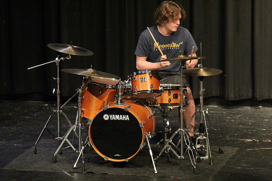 Junior Spencer Smith plays the drums.