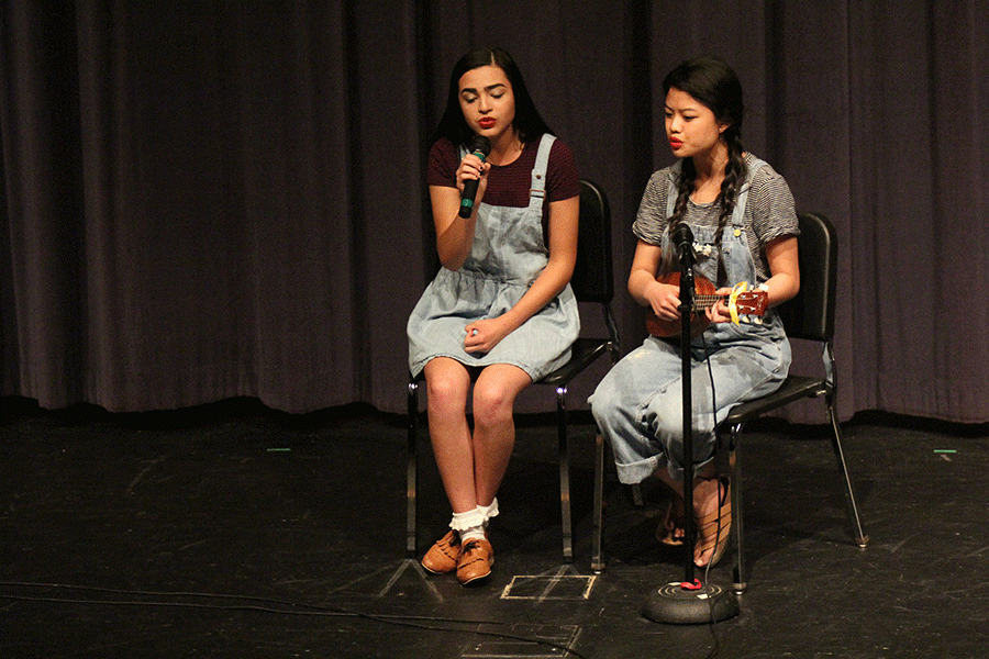 At the talent show, seniors Gabby Saunders and Camille Gatapia sing a duet.  