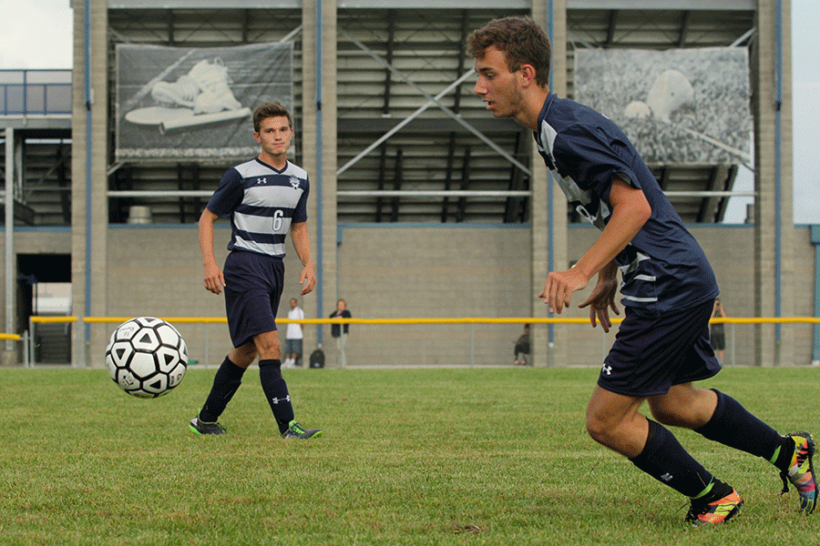 After senior Sam Lopez passes the ball, senior Ethan Doyle sprints to keep the ball in Jag possession. The Jags beat the Trailblazers 3-2 on Friday, Aug. 26.
