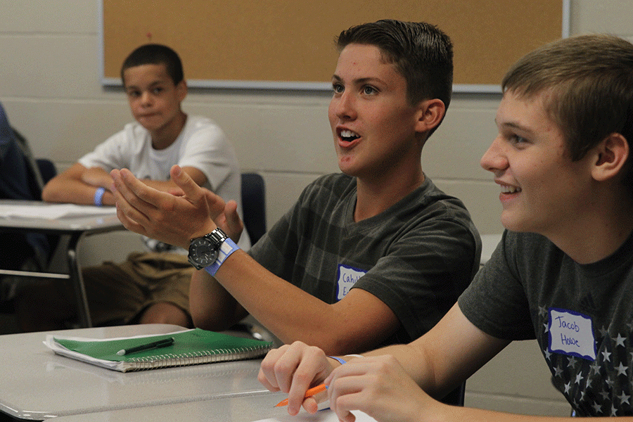 Freshman Cahill Eckhardt tells a story about his summer in his first high school class.