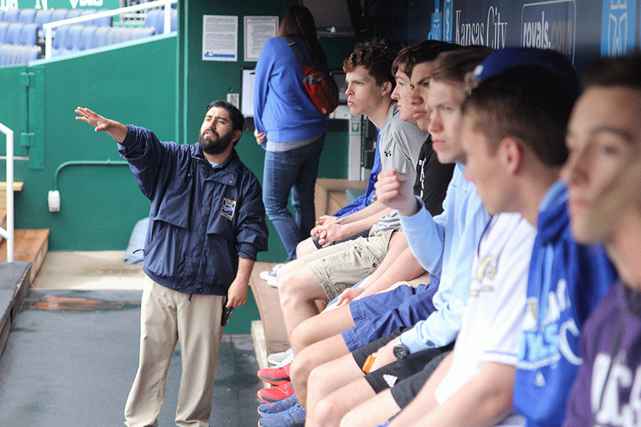 Sitting+in+the+dugout+at+Kauffman+Stadium%2C+former+seniors+enjoy+their+class+cup+reward.