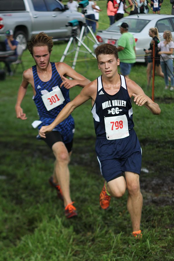 Senior Braden Shaw holds off his opponent near the end of the race.