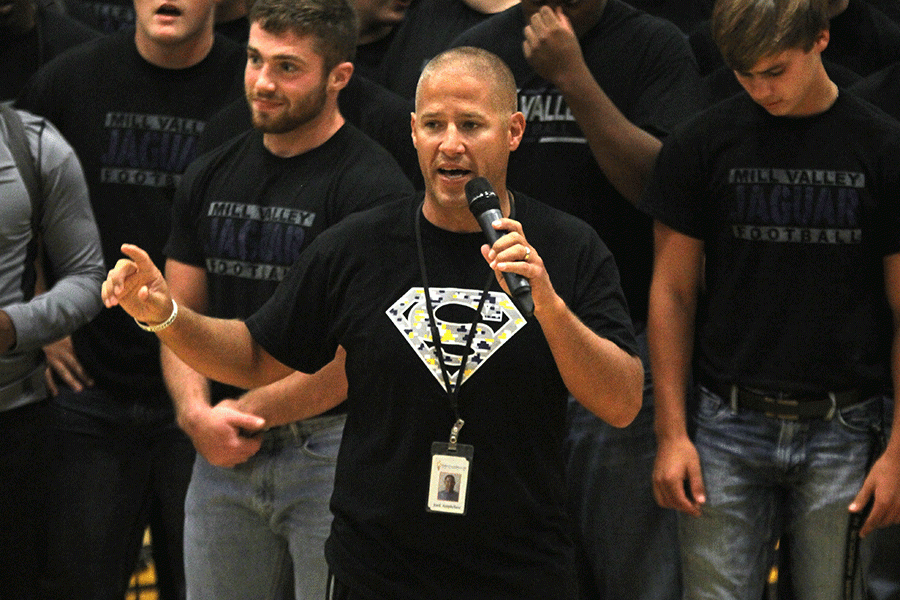 Football coach Joel Applebee introduces the team.