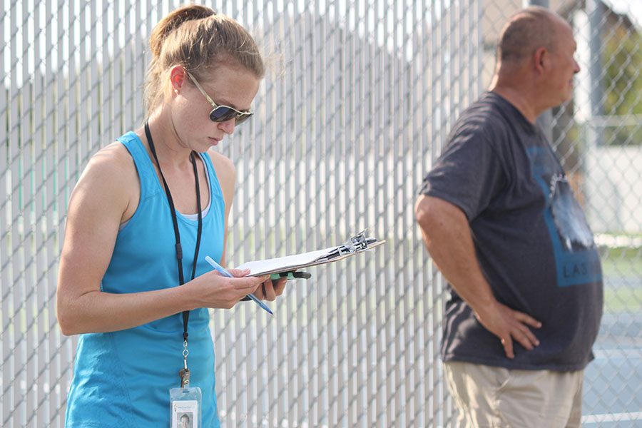 Coach Abby Teetsel looks at her list before calling out which teams will play each other next.