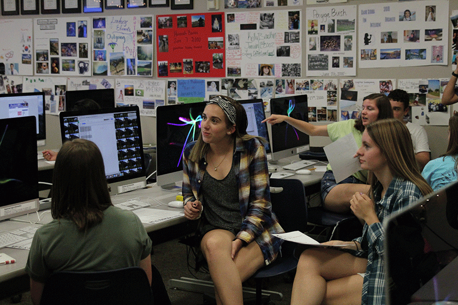 Junior Claire Boone and Lexi Flipse work together on their project. 